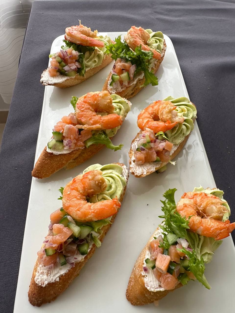 Box Bruschetta with Salmon and Shrimp — Gourmet tapas catering delivery in Alicante | Reina de Tapas