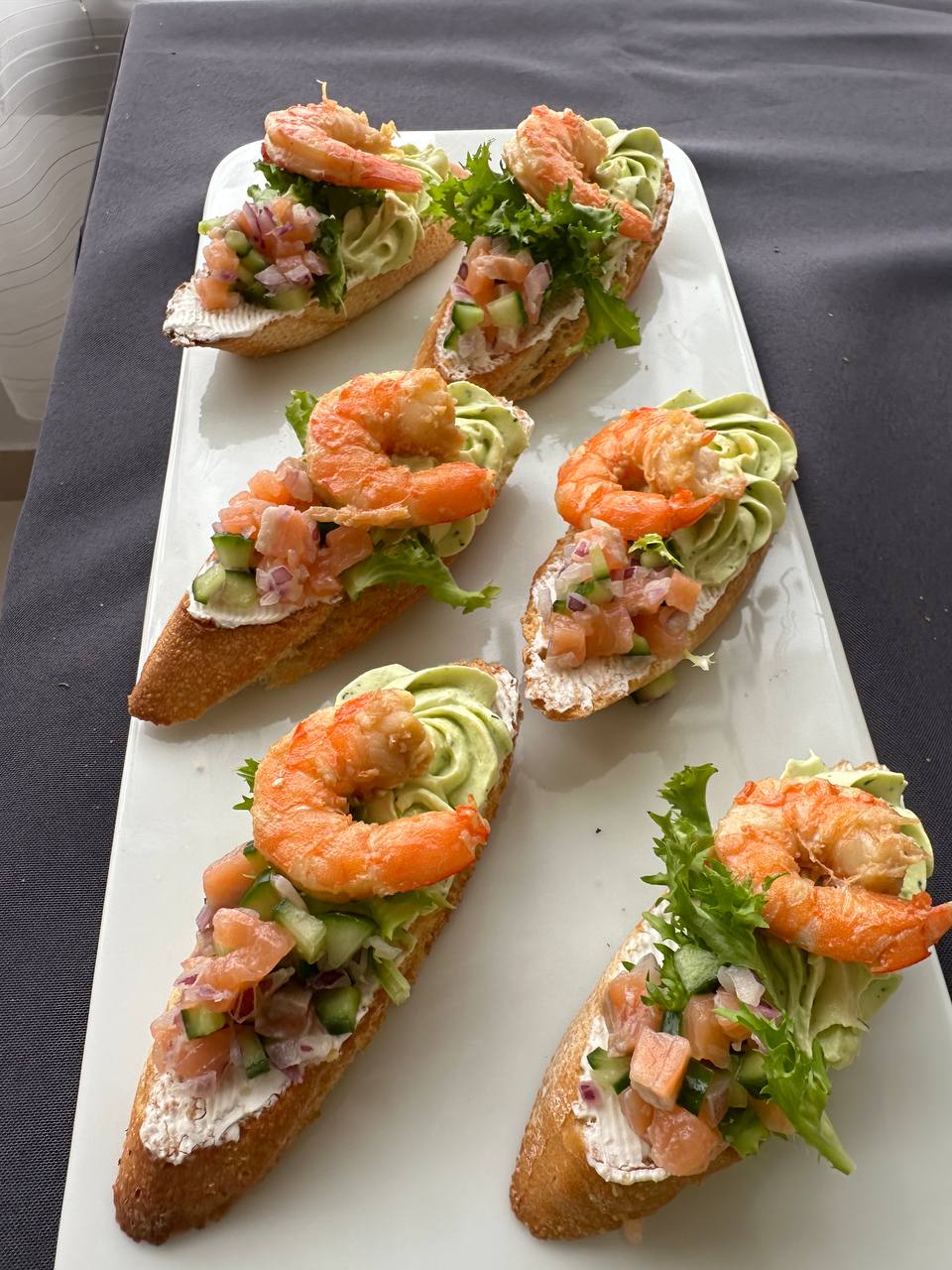 Box Bruschetta with Salmon and Shrimp — Gourmet tapas catering delivery in Alicante | Reina de Tapas